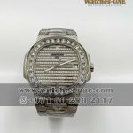 The Patek Philippe  Nautilus 5719/10G  Self-winding